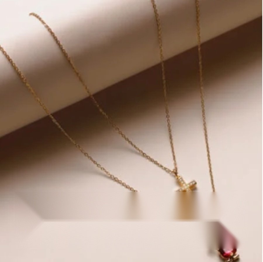 Layered gold necklaces